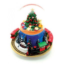 Palla di neve con l'albero di Natale e treno